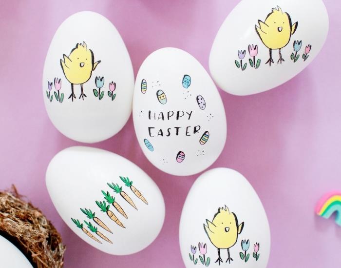 baltų Velykų kiaušinių modelis su dekoravimu piešinyje, pagamintas naudojant netoksišką žymeklį su gyvūnų ir augalų dizainu