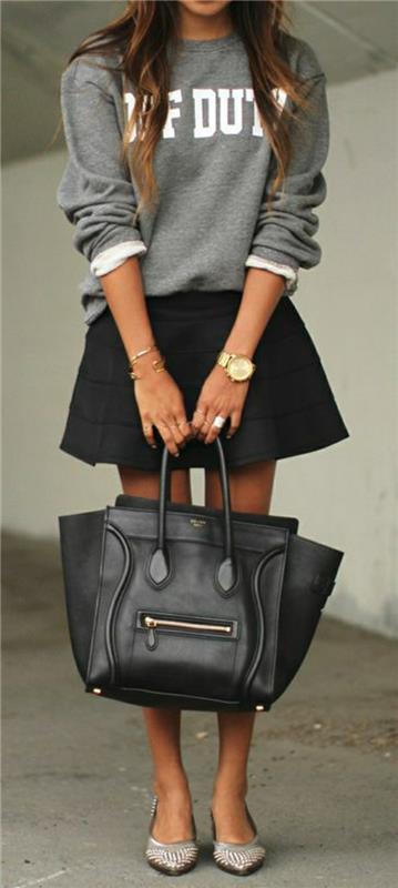 pilka-megztinė-moteris-juoda-platėjanti-sijonas-juoda-odinis krepšys