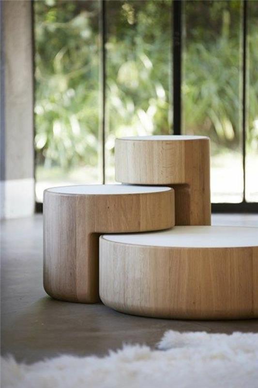 dizainas-kavos staliukas-medyje-gyvenamajam kambariui-baltas kilimas-dizainas-kavos-stalas-musė-kavos staliukas
