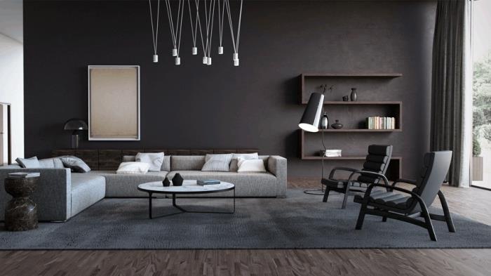 siyah ve açık gri mobilyalarla döşenmiş kömür grisi duvarlara sahip geniş bir oturma odasında modern iç tasarım fikri