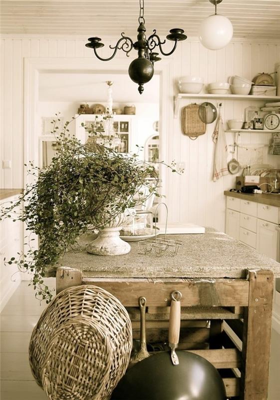 elegantna podeželska miza, bele police, osrednji leseni in betonski otok, bela dekoracija namiznega pribora, originalna viseča svetilka, retro cvetlični osrednji del