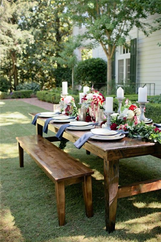 piknik-masa-yeşil-çim-çiçek-tabak-on-the-ahşap-masa-masa-dekorasyonu