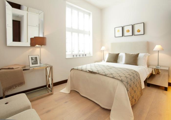 bej yatak ve modern metalik kaplama mobilyalar ile yetişkin eksiksiz yatak odasında minimalizm ve stil