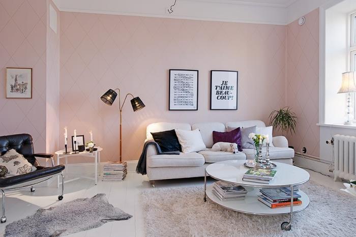 rožiniai milteliniai dažai gyvenamajame kambaryje, kambarys su rožinėmis sienomis ir baltomis lubomis su baltais ir juodais baldais, kava ir apvalaus stalo modelis gyvenamajam kambariui