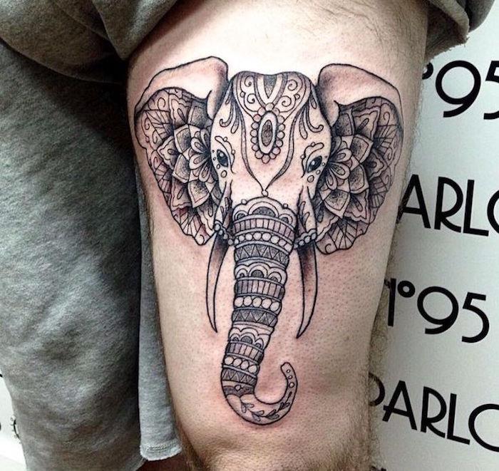 tetovaža na stegnu človek tetovaža slon mandala