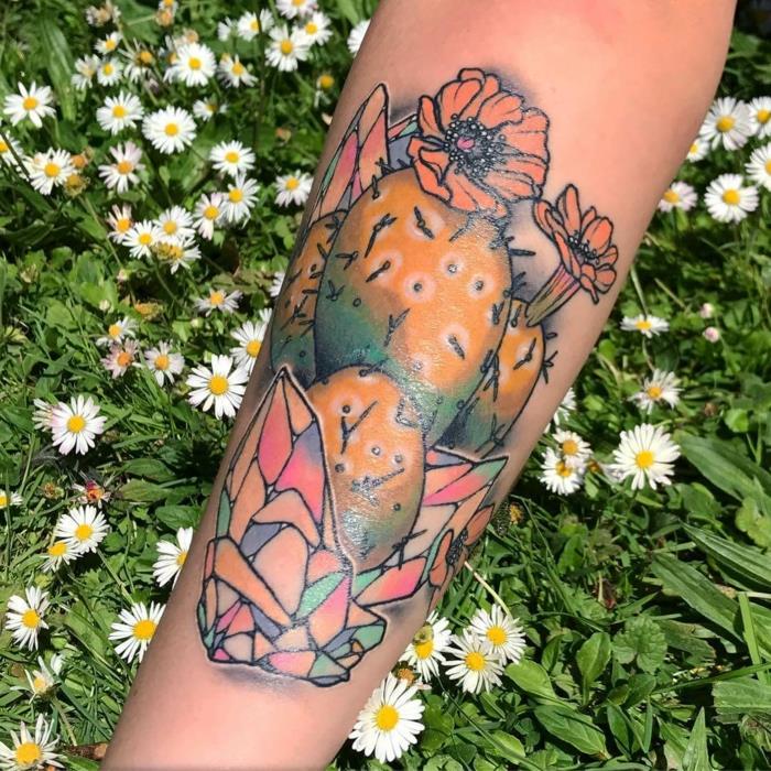 Moteriškos rankos tatuiruotė, įsivaizduojamas piešinys, meninė tatuiruotė ant dilbio