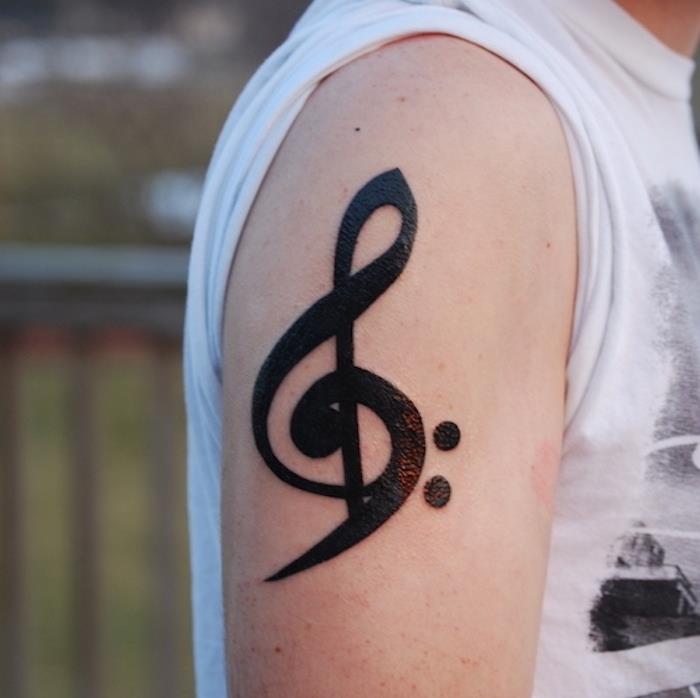tatuiruotė aukštas raištis boso raištis ant rankos žmogaus nata muzika