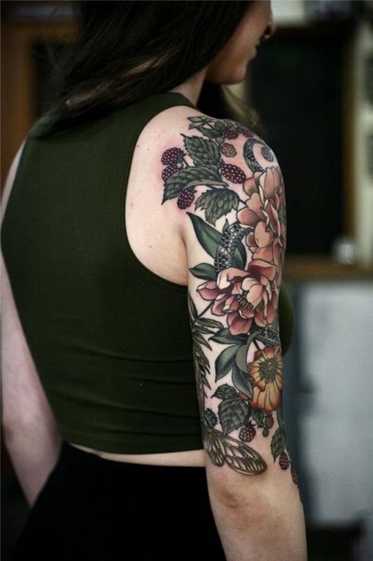 tetovaža pisanih rož in sadja, zeleno listje, pisana cvetlična ideja tetovaže, zelen vrh, črni lasje