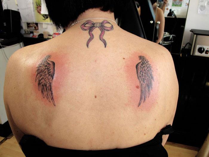 tatuiruotės idėja moteris sparnai atgal pečių ašmenys angelas
