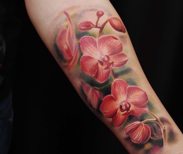 Rožinė orchidėjų gėlių tatuiruotė dilbio