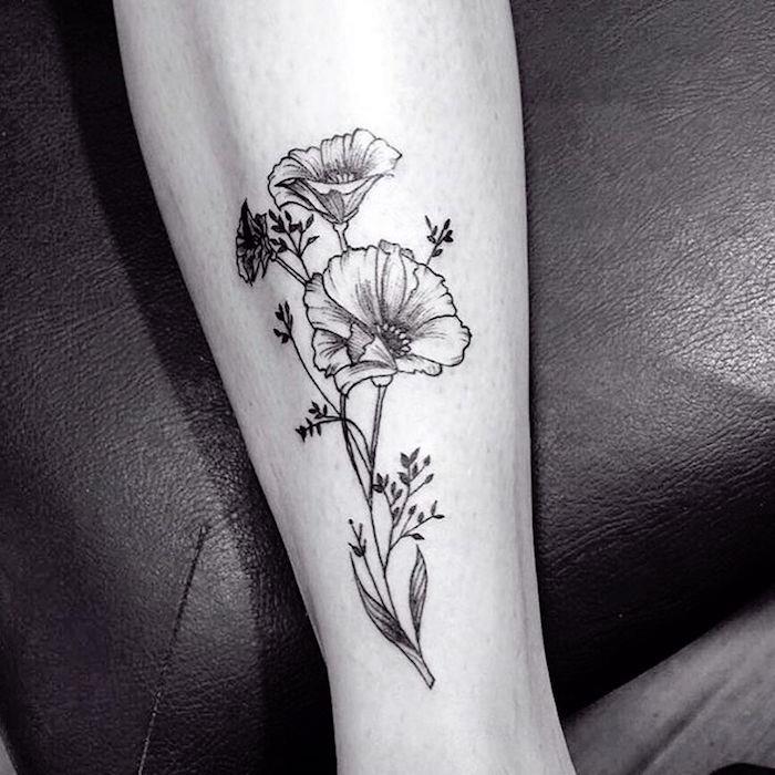 siyah beyaz haşhaş sembolü dövme ve çiçek dövme tasarımı