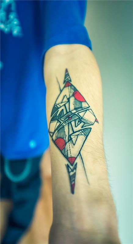 izvirna ideja za moško tetovažo podlakti z grafičnim oblikovanjem z origami vzorcem