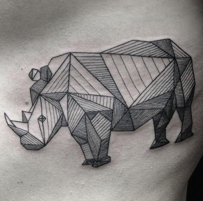 popolnost linij geometrijske tetovaže nosoroga spominja na živali origami
