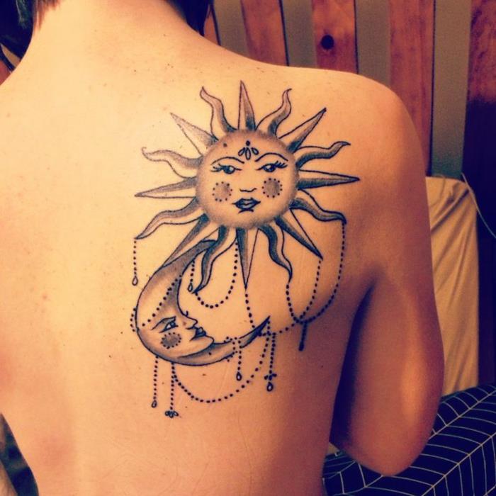 mėnulio tatuiruotės reikšmė, moters nugaros tatuiruotė, saulė ir mėnulis kartu