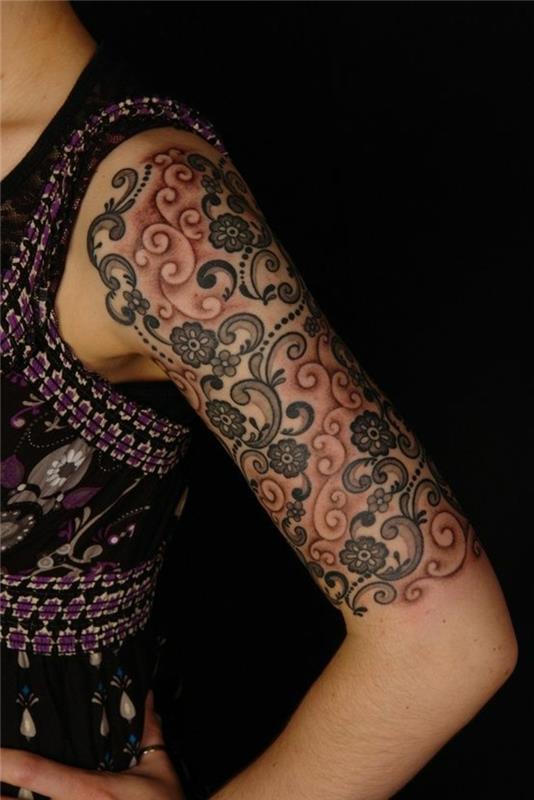 moters rankogalių tatuiruotė, tatuiruota ranka, abstraktaus stiliaus gėlės, spalvingos arabeskos