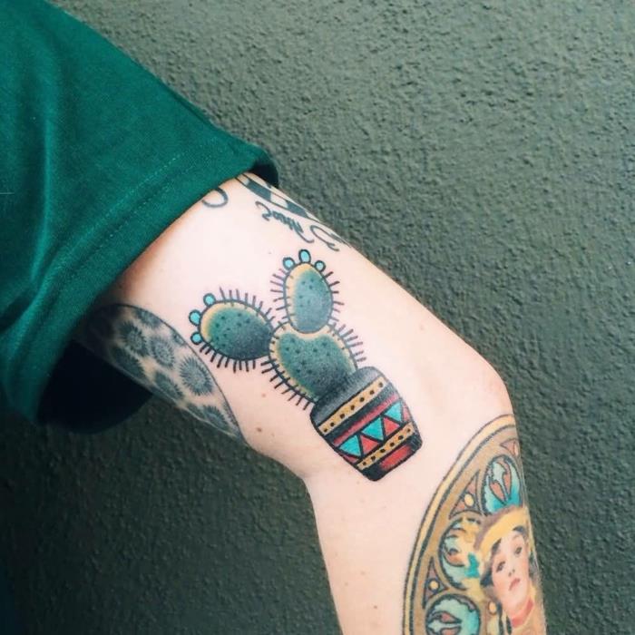 vyro rankogalių tatuiruotė, gėlių puodas etniniai spalvingi raštai
