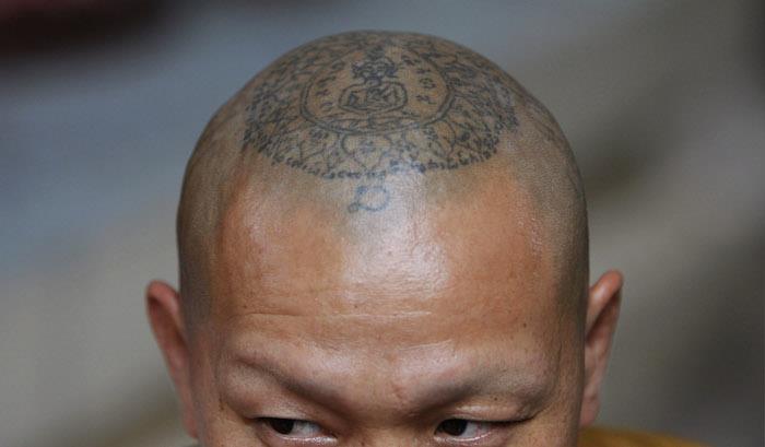Tibeto vienuolio budistų simbolio tatuiruotė