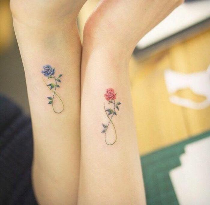 tatuaggio-fiori-idea-elegante-rose-colorate-foglie-verdi-interno-simbolo-infinito