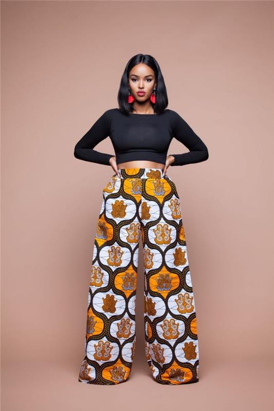 Ideja o etničnem nakitu za ženske, model širokih hlač v afriškem slogu, ženska obleka v črnem kropu in etnične hlače