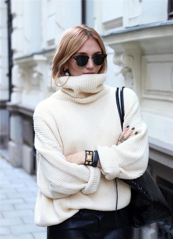 gerai apsirengusi moteris, balto megztinio kaklo megztinio modelis kartu su juodu odiniu sijonu