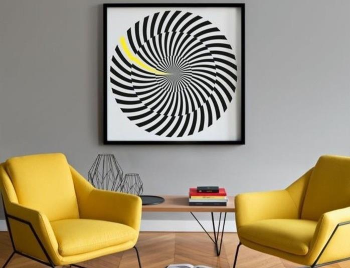 Idėja ateina abbinare i colori, parete grigia accostamento poltrone soggiorno gialle, quadro grafico