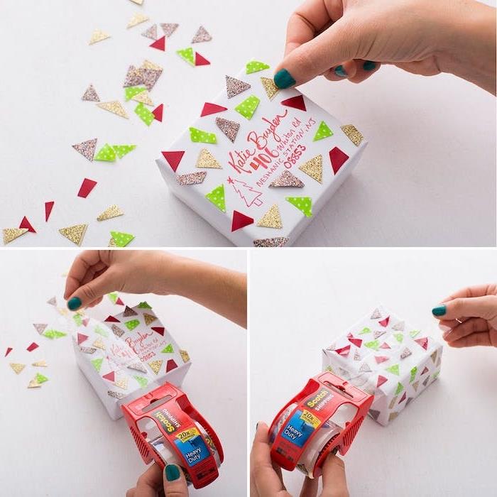 barvni papirnati trikotniki na beli papirni embalaži, lepilni trak, okrasitev darilnega paketa