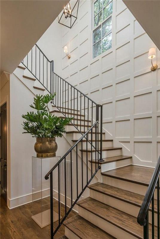 sodobna dekoracija hodnika, super elegantno spiralno stopnišče, lestenec z lučkami, bela stenska obloga