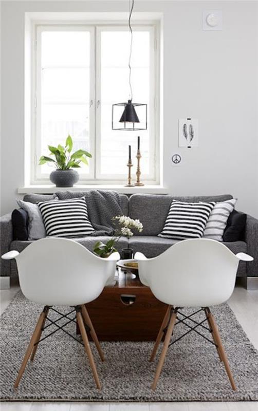 lepa-dnevna soba-obarvana-sivo-beli-stoli-v-dnevni sobi-sivo-pohištvo-in-siva preproga-svetnik-maclou-