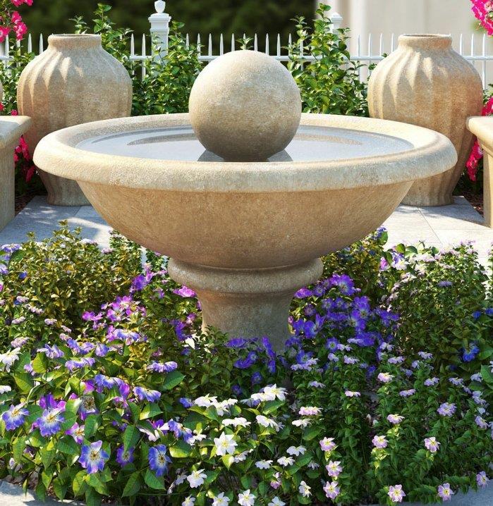kamniti vodnjak, obdan z vijoličnimi in belimi cvetovi v obliki kroga, bela ograja, zunanja dekoracija, eksotična pokrajina