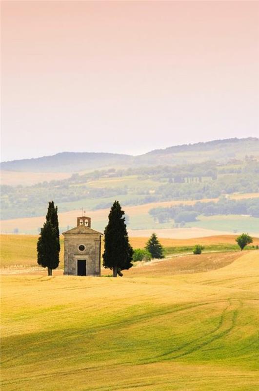 val-d-orcia-landscape-of-toscan-italy-fields-with-an-italian-church