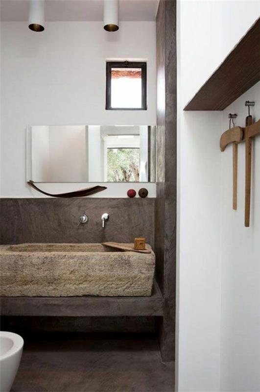 pravokotni kamen-umivalnik-v-minimalistični kopalnici