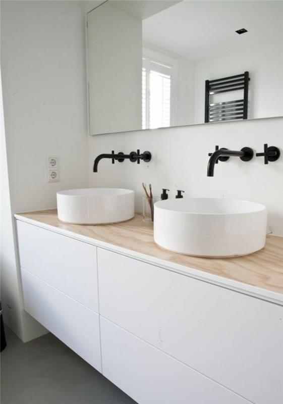 okrogel umivalnik-dve-beli umivalniki-v-okrogli obliki-elegantna-toaletna enota