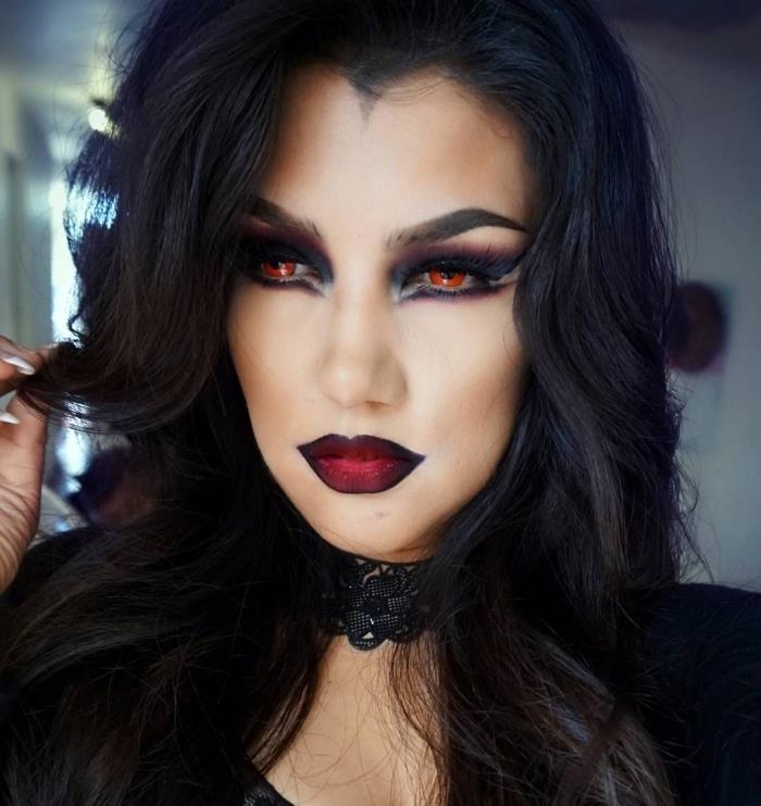 vampyro Helovino makiažo technika su raudonais lęšiais, ombré efekto lūpų makiažo pavyzdys